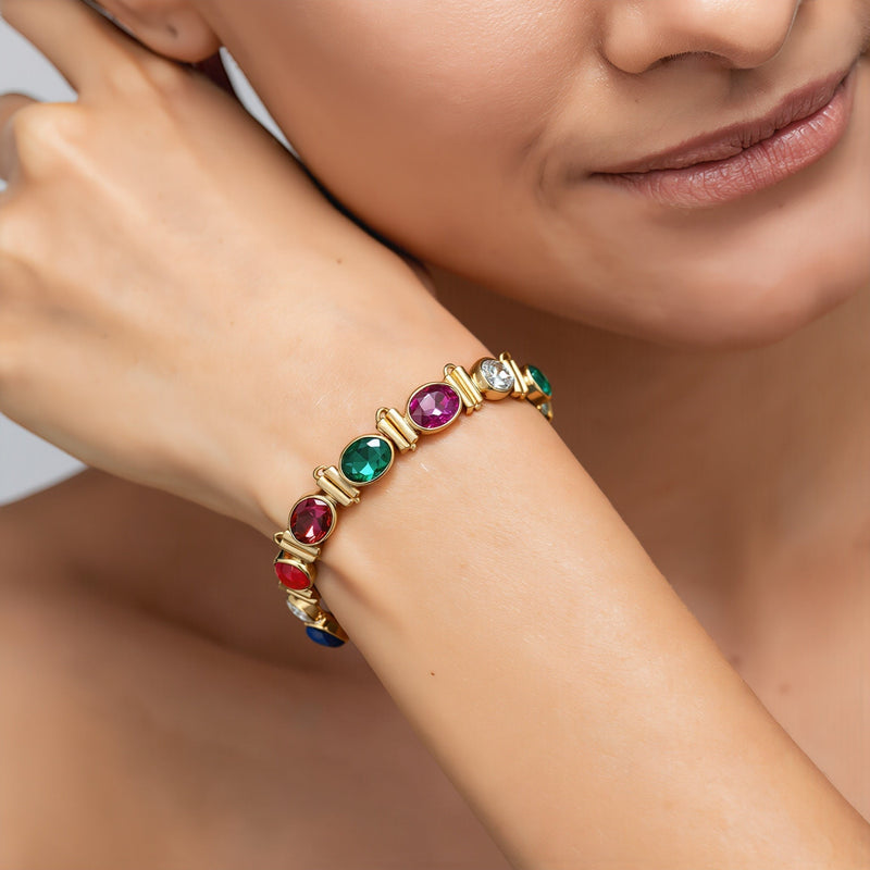 Amara Jewels multi-gemstone bracelet with oval ruby, emerald, sapphire, citrine, peridot, and clear stones in 18K gold vermeil.