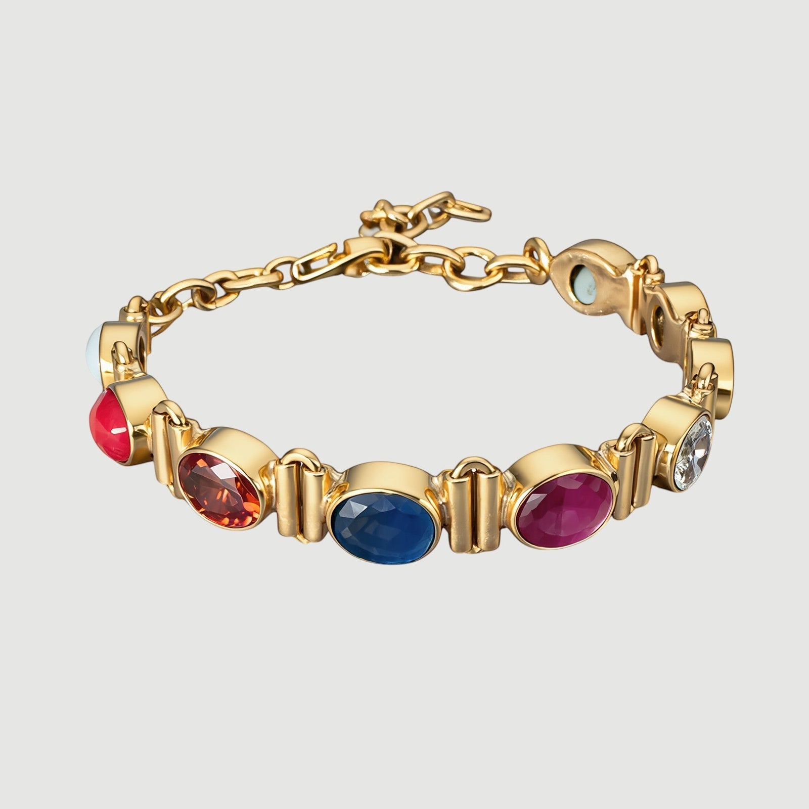 Amara Jewels multi-gemstone bracelet in 18K gold vermeil over sterling silver with ruby, garnet, sapphire, citrine, peridot, and clear stones.