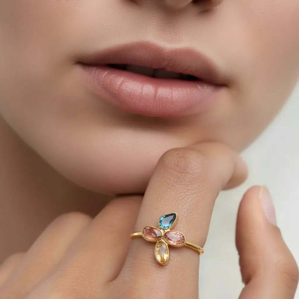 Amara Jewels 18K gold plated sterling silver ring with amethyst and two purple tourmalines.