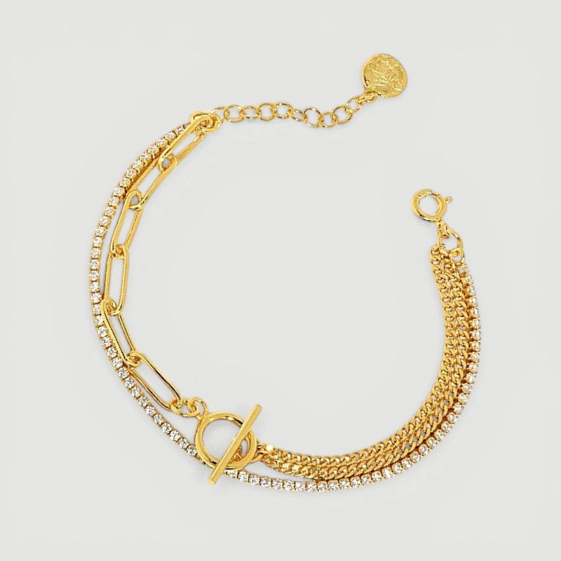 Amara Jewels layered rhinestone gold chain bracelet with toggle clasp featuring circle T charm.