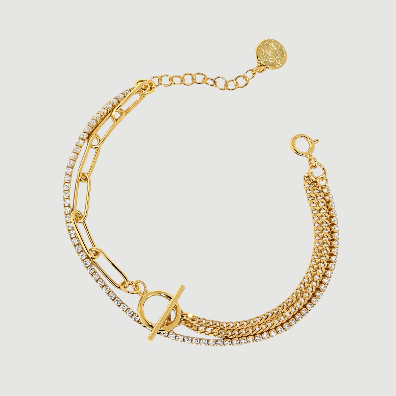 Amara Jewels layered rhinestone gold chain bracelet with toggle clasp featuring circle T charm.