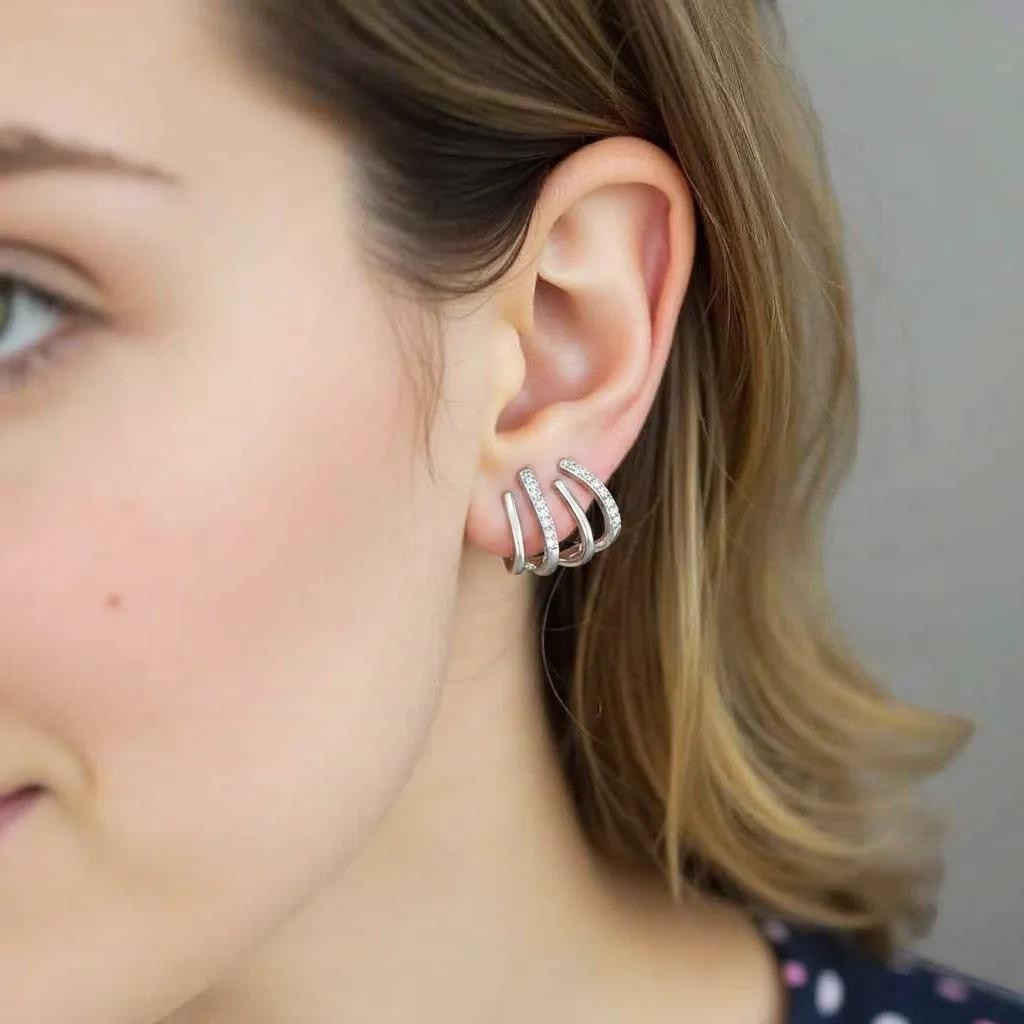 Amara Jewels sterling silver multi-row stud earrings with crystal accents, modern design.