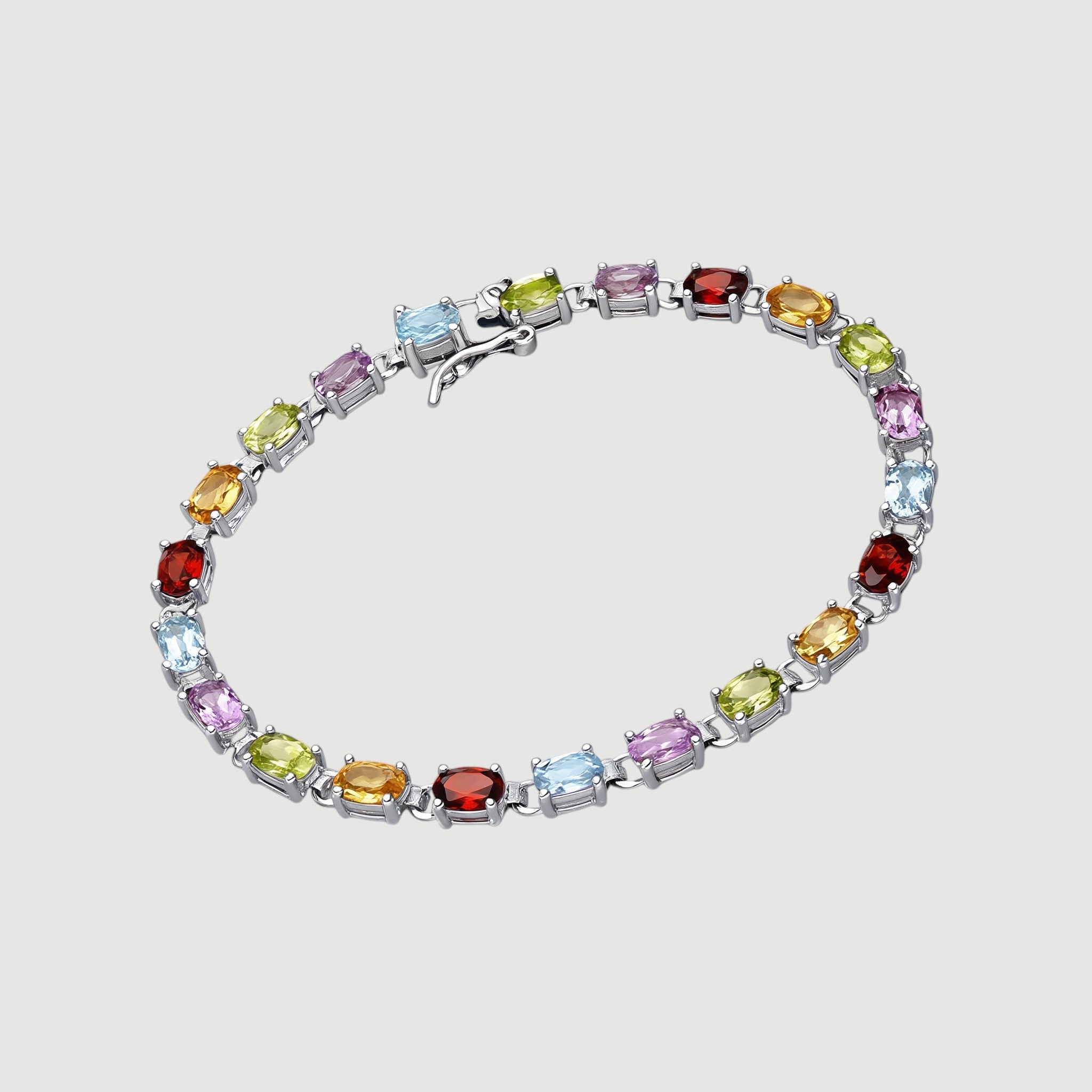Amara Jewels multicolour oval gemstone tennis bracelet in 925 sterling silver, perfect for adding colour to any outfit.