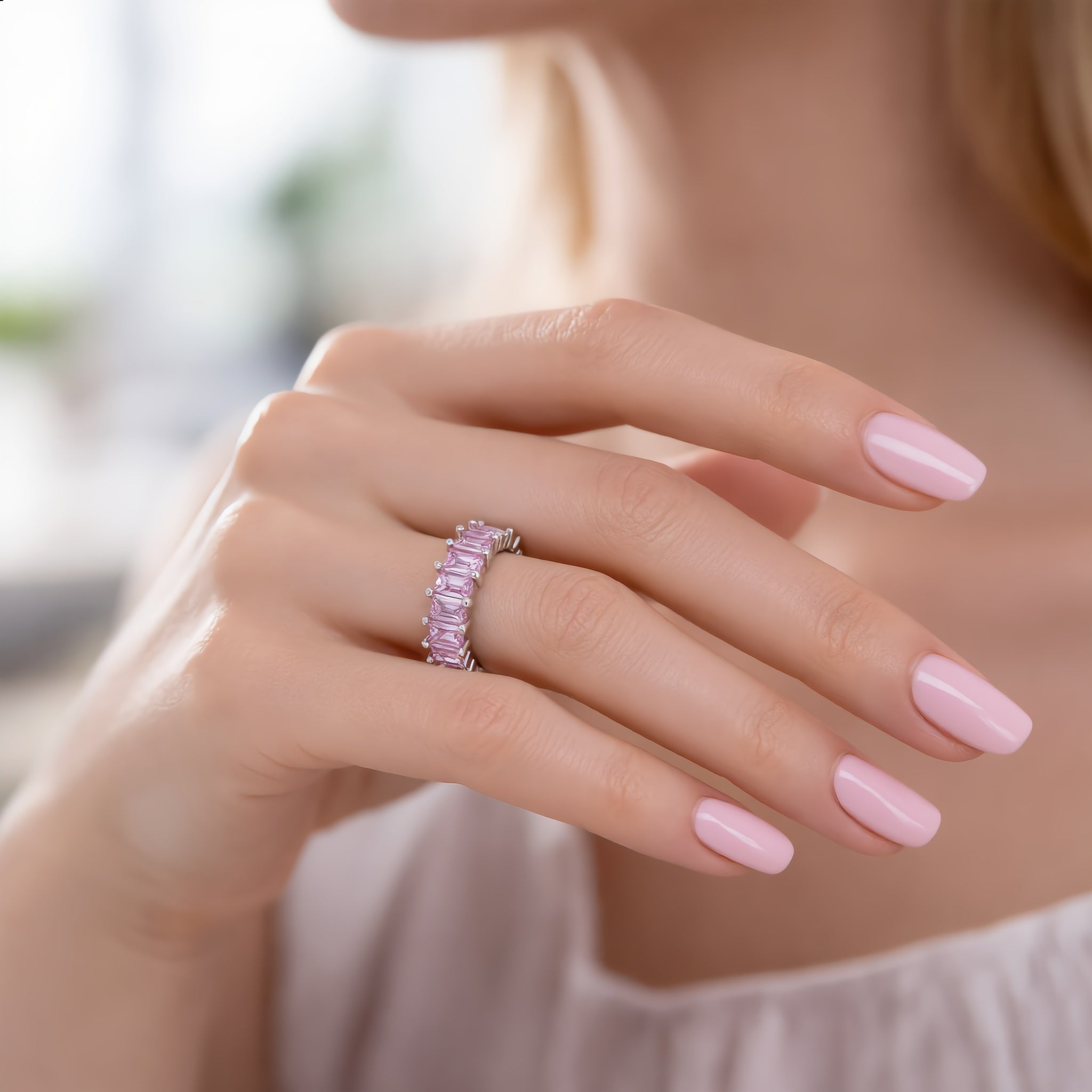 Amara Jewels pink baguette eternity ring in sterling silver with a polished