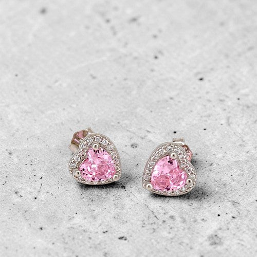 Amara Jewels pink heart-shaped cubic zirconia stud earrings with a halo of clear cubic zirconia accents, crafted from sterling silver.