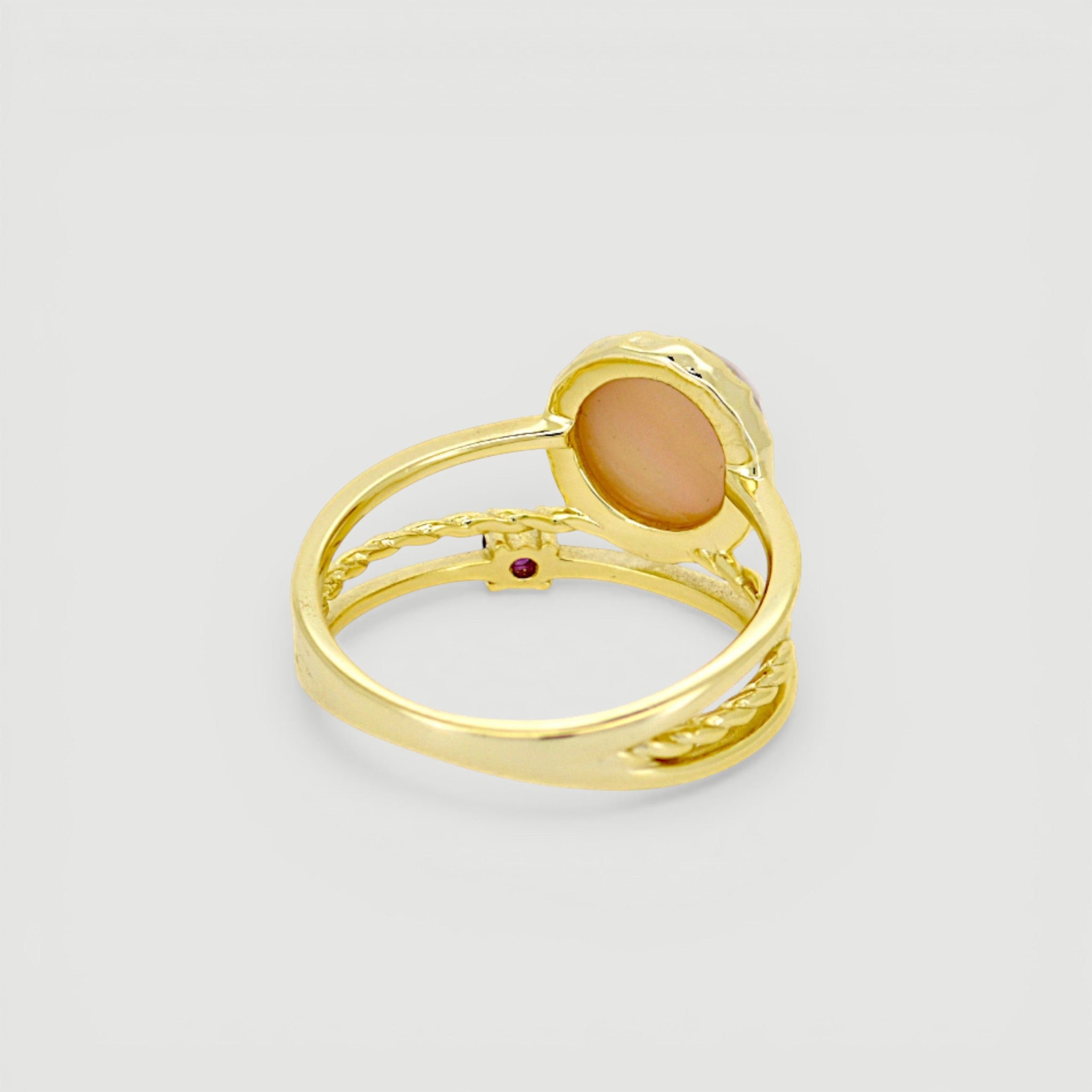 Amara Jewels gold-plated sterling silver ring with a pink shell pearl and a small ruby accent.