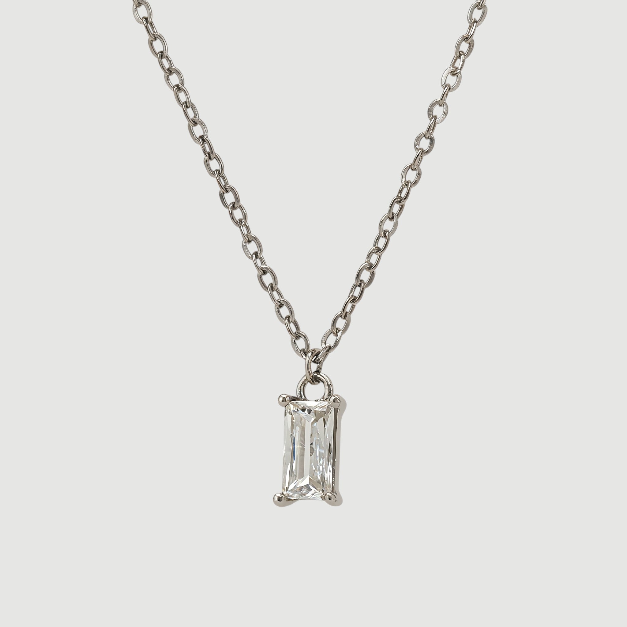 Amara Jewels rectangular clear crystal pendant necklace with rhodium-plated sterling silver chain.