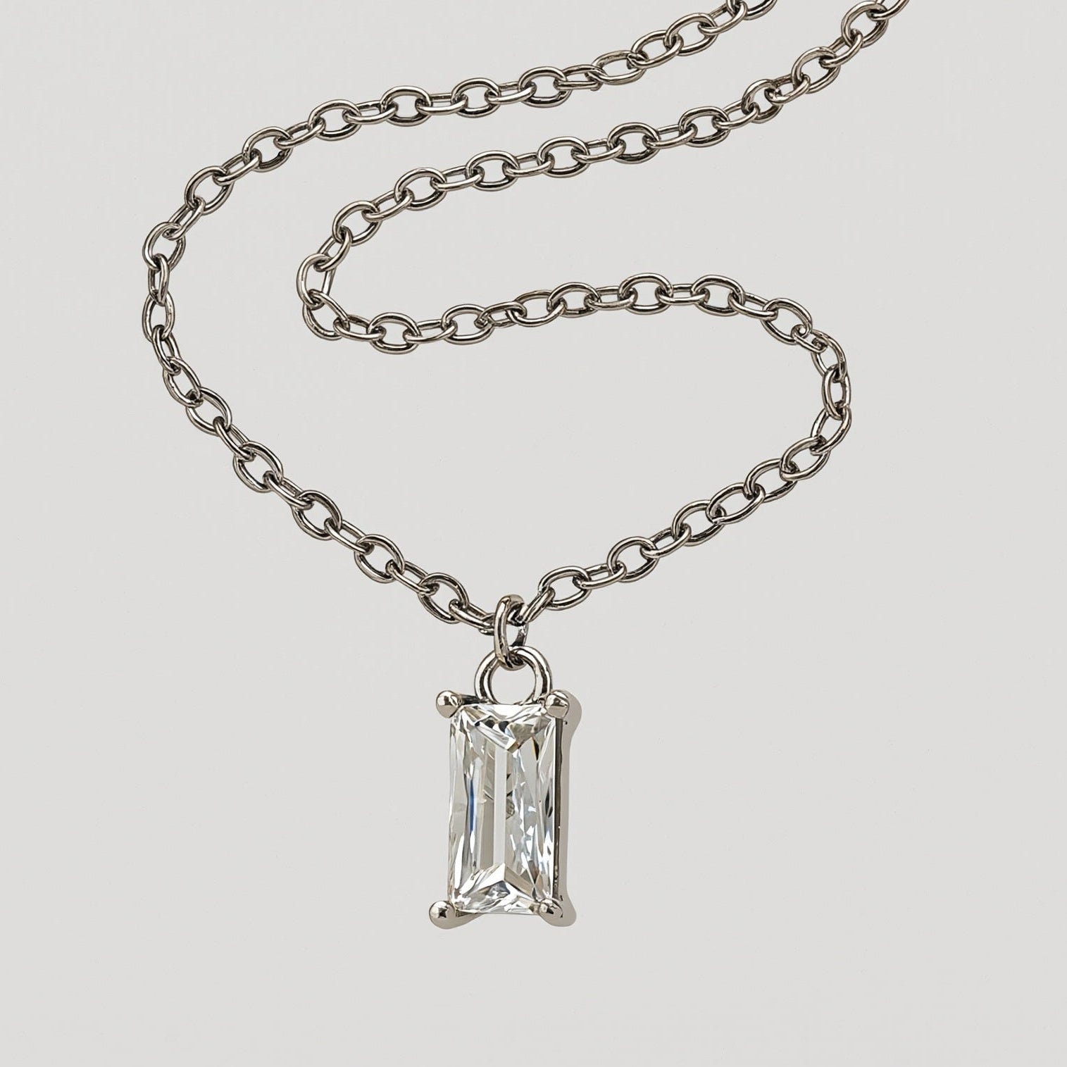 Amara Jewels rectangular clear crystal pendant necklace with rhodium-plated sterling silver chain.