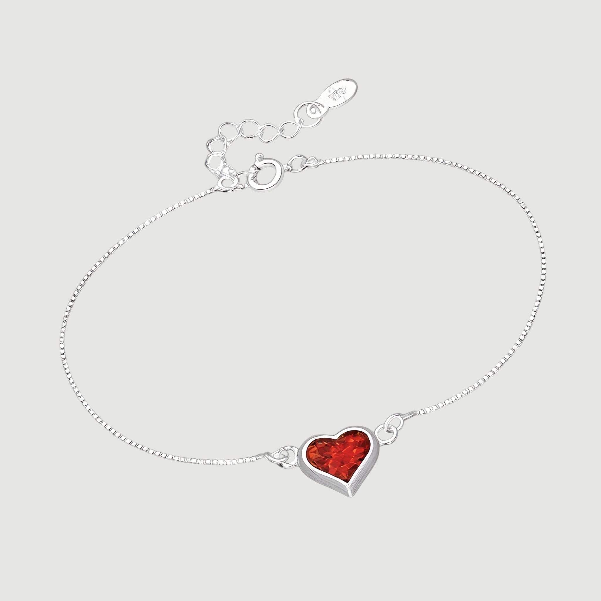 Amara Jewels red heart charm bracelet on a delicate 925 sterling silver adjustable chain.