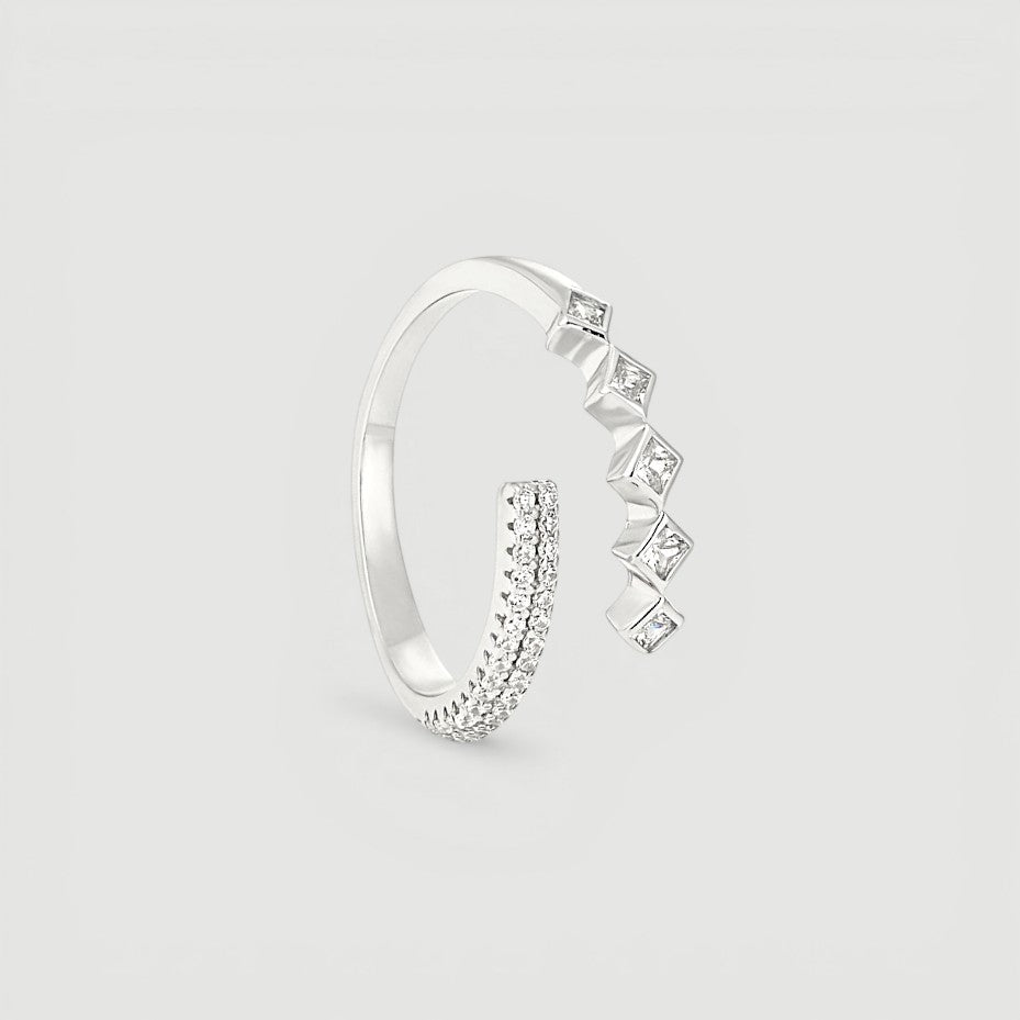 Amara Jewels sterling silver open ring with alternating cubic zirconia rhombus details and pave band.