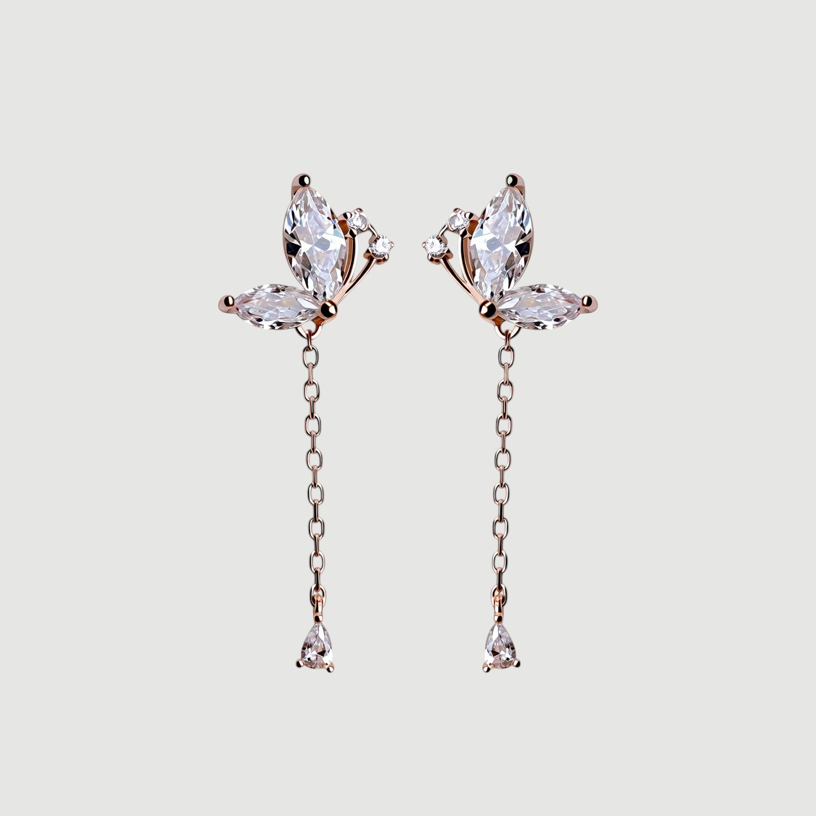 Amara Jewels rose gold plated sterling silver butterfly drop earrings with marquise and teardrop cubic zirconia stones.