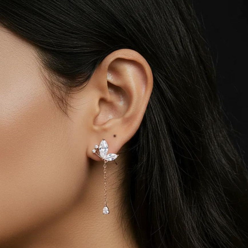 Amara Jewels rose gold plated sterling silver butterfly drop earrings with marquise and teardrop cubic zirconia stones.