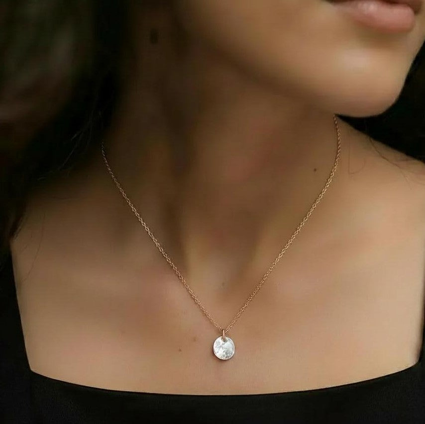 Amara Jewels rose gold plated sterling silver necklace with clear crystal solitaire pendant.