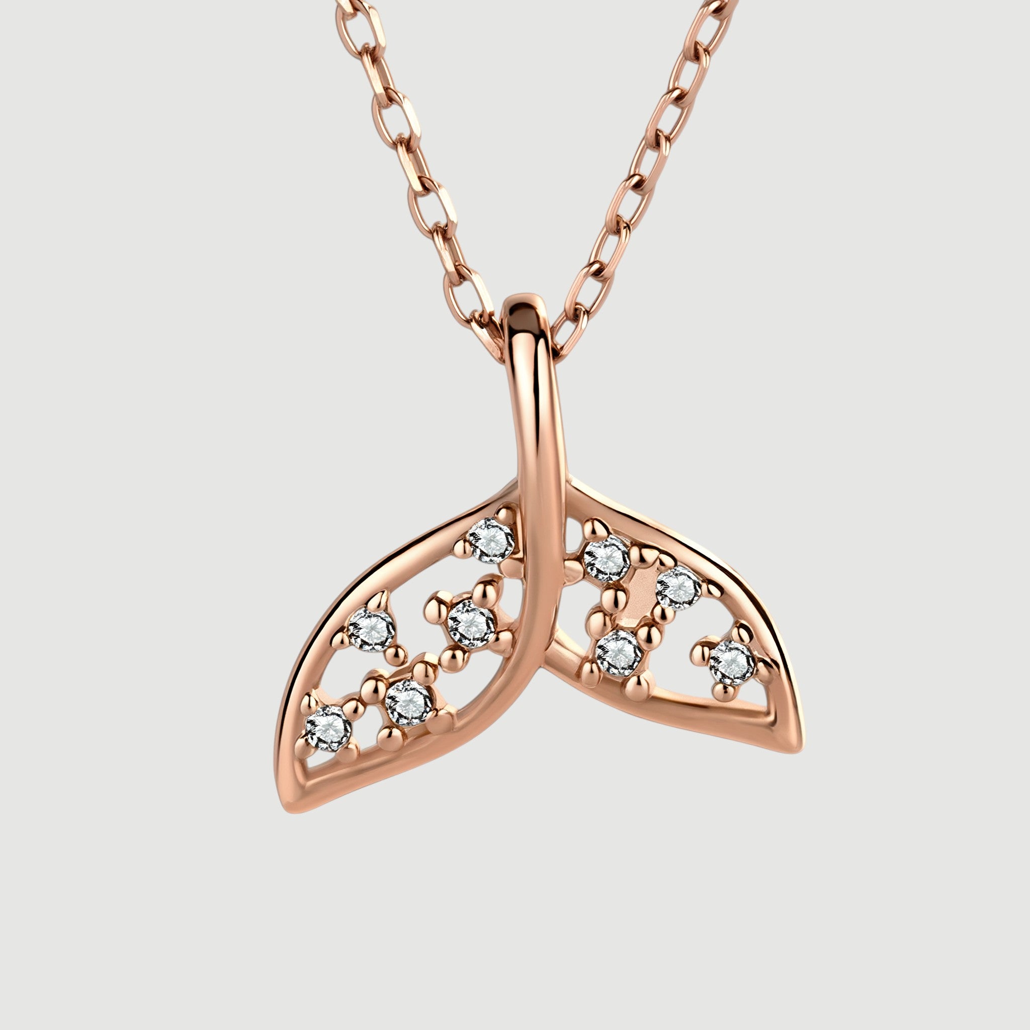 Amara Jewels rose gold plated sterling silver fishtail necklace with cubic zirconia stones.