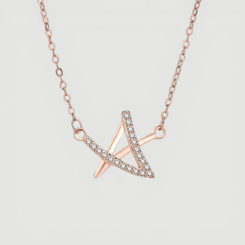 Amara Jewels rose gold geometric pendant necklace with crystals on a delicate chain.