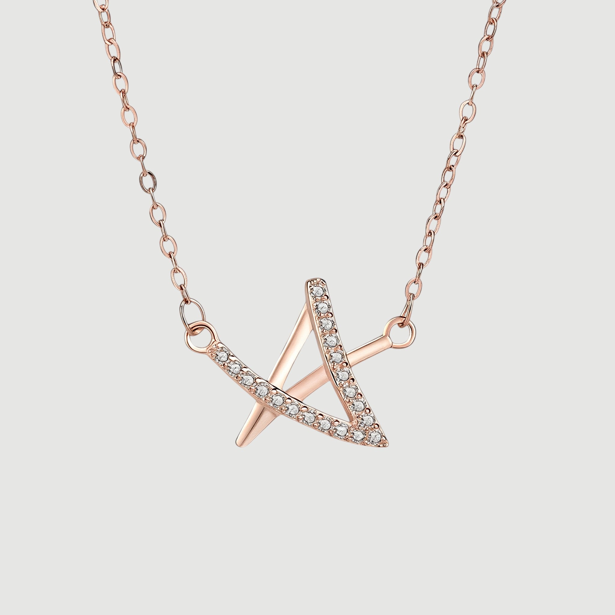 Amara Jewels rose gold geometric pendant necklace with crystals on a delicate chain.