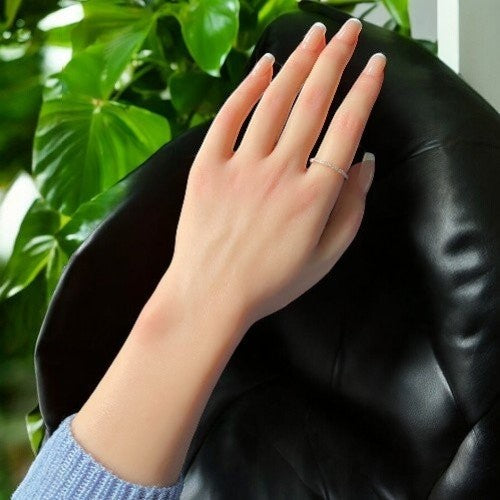 Amara Jewels rose gold stacker ring with clear stones. Minimalist band with a continuous row of shimmering stones.