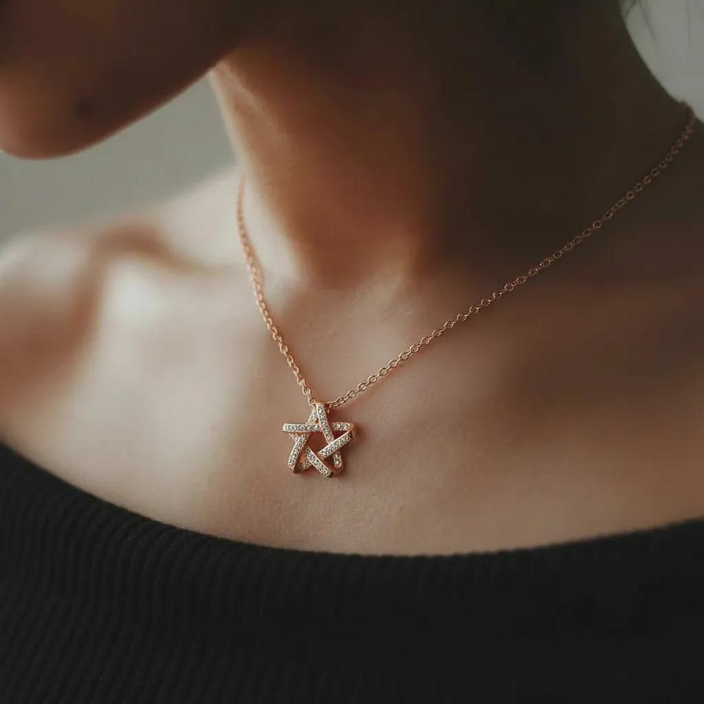 Amara Jewels rose gold plated 925 sterling silver necklace with a crystal-embellished star pendant.