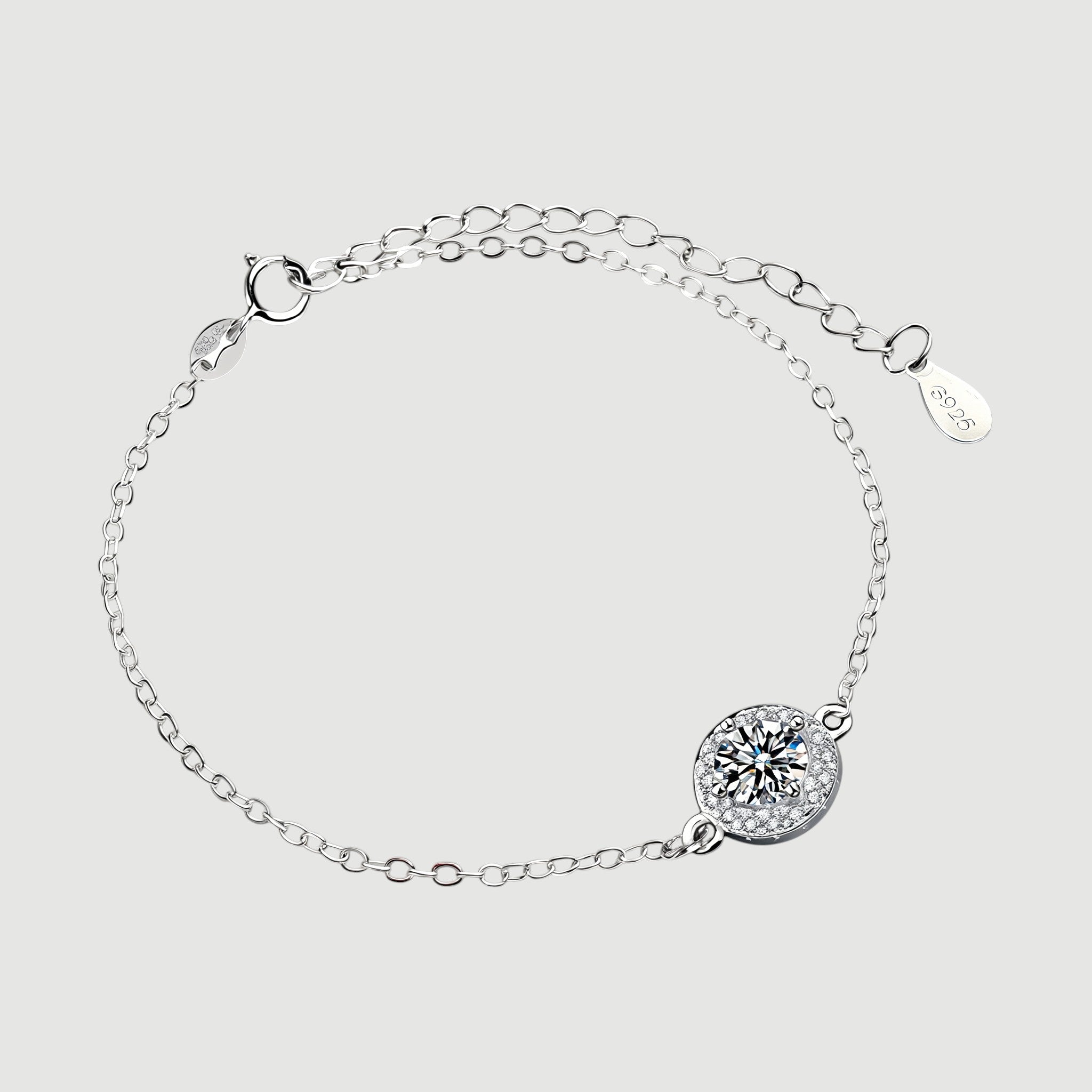 Amara Jewels 925 sterling silver bracelet with round halo zircon charm and adjustable chain.