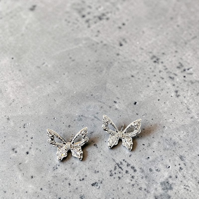 Amara Jewels 925 sterling silver butterfly stud earrings with openwork wings and clear cubic zirconia.