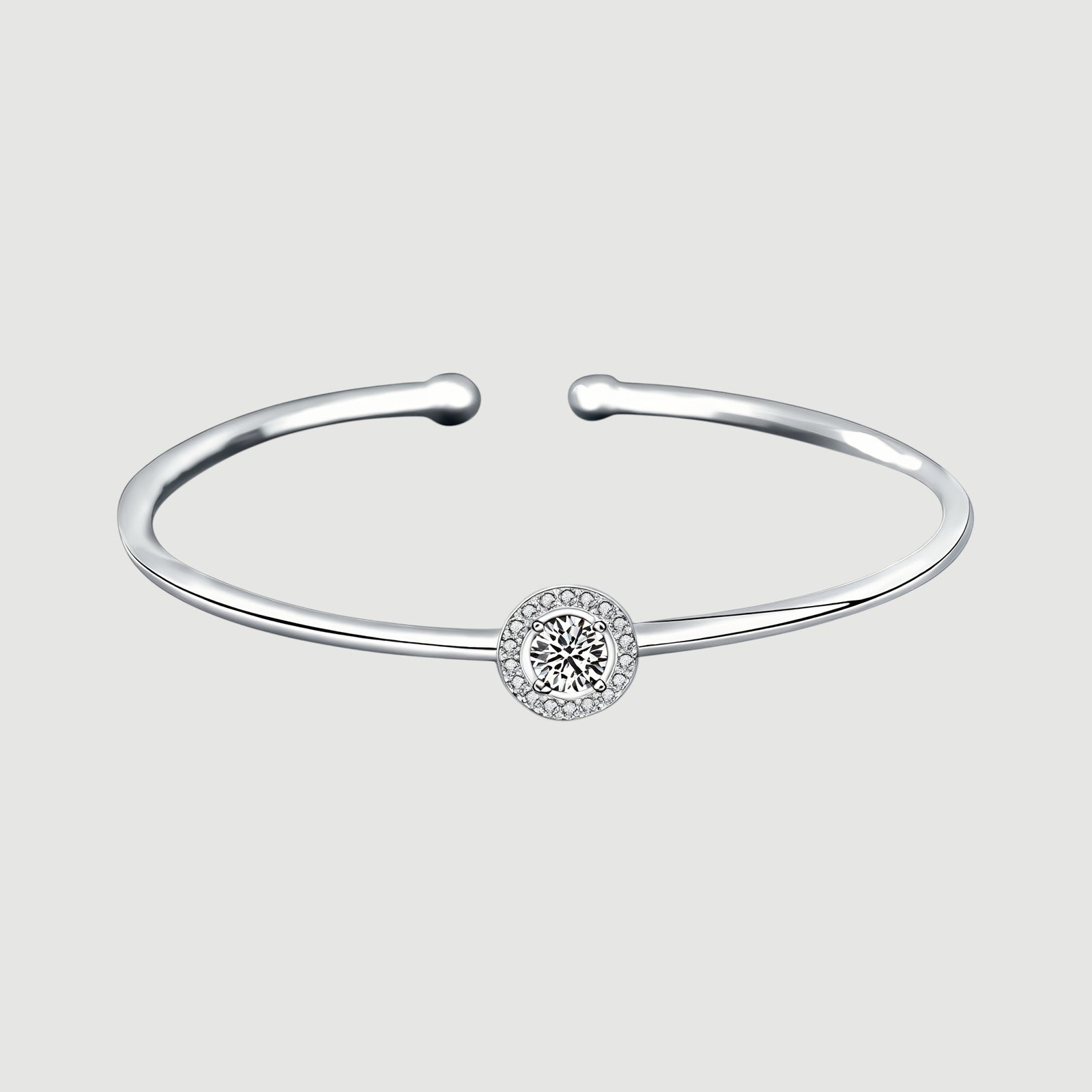 Amara Jewels 925 sterling silver bangle with a sparkling crystal centerpiece, perfect for adding elegance to any outfit.