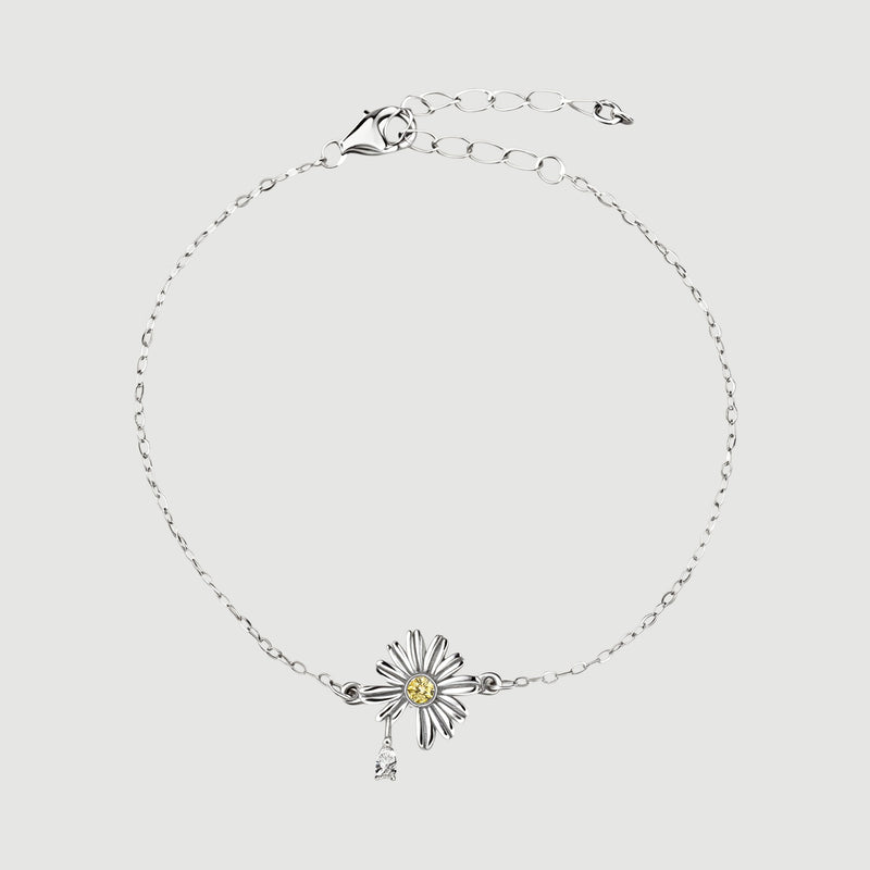 Amara Jewels 925 sterling silver daisy bracelet with yellow and white zircon stones, delicate chain and heart clasp.