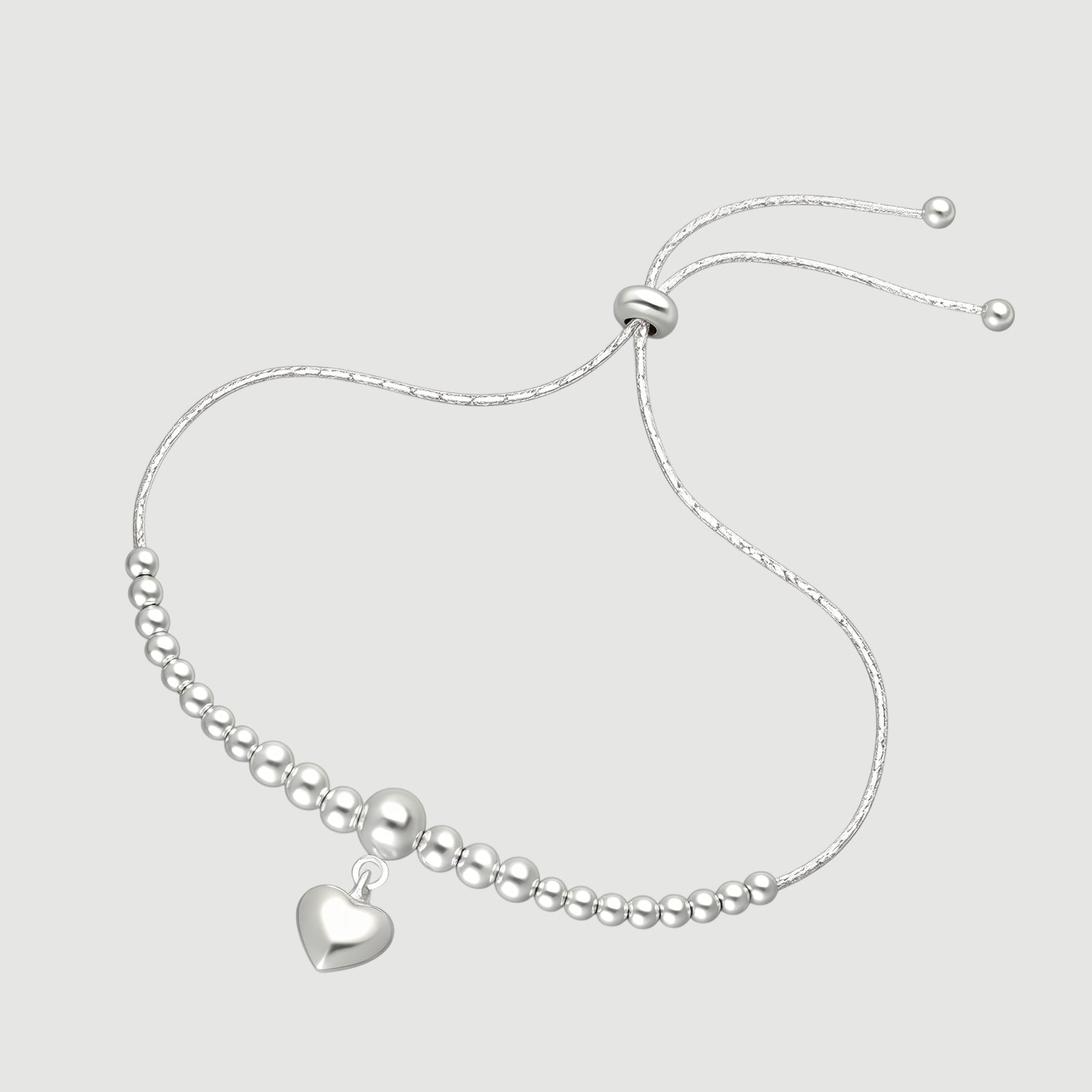 Amara Jewels sterling silver beaded bracelet with a dangling heart charm and adjustable sliding closure.