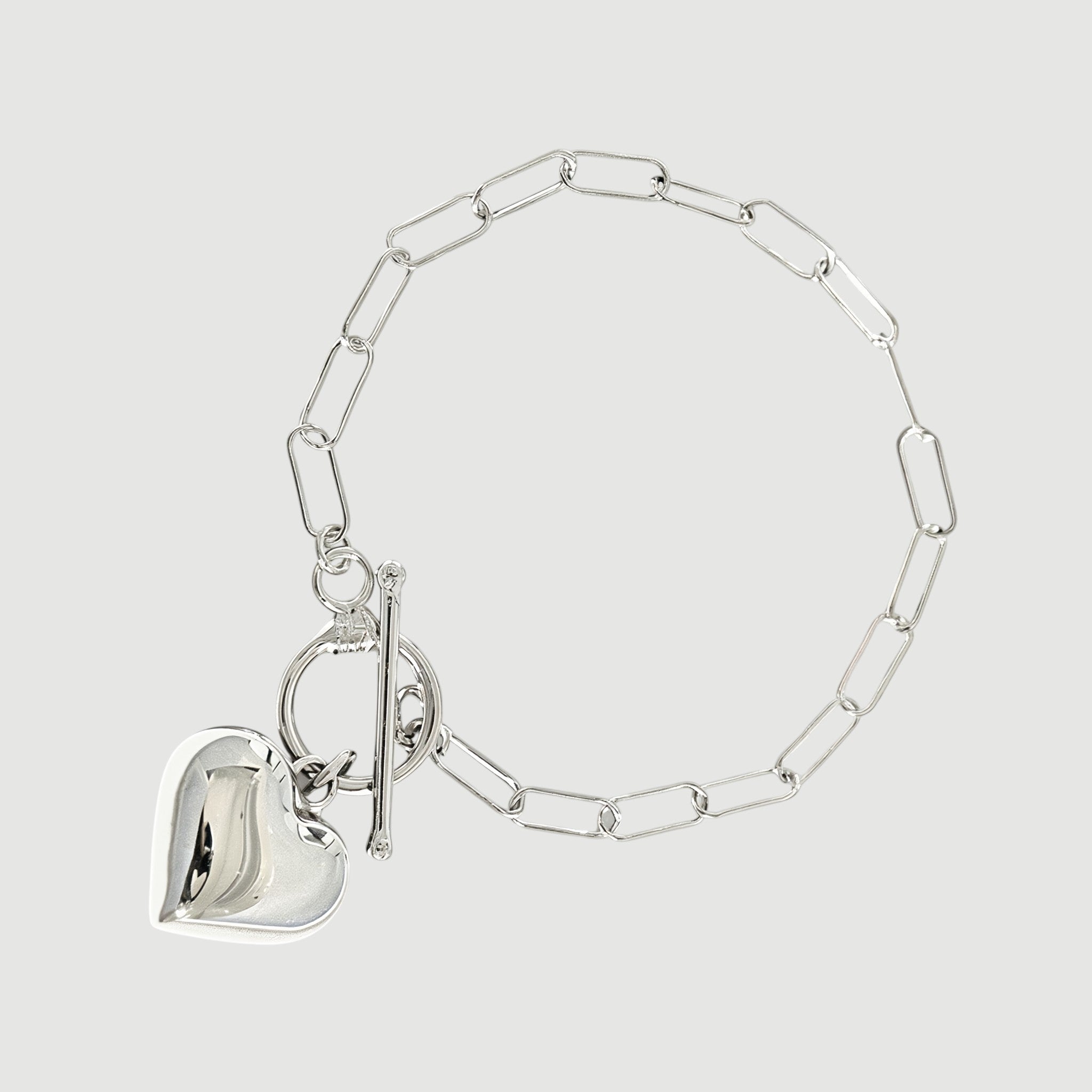 Amara Jewels sterling silver paperclip chain bracelet with toggle clasp and polished heart charm.
