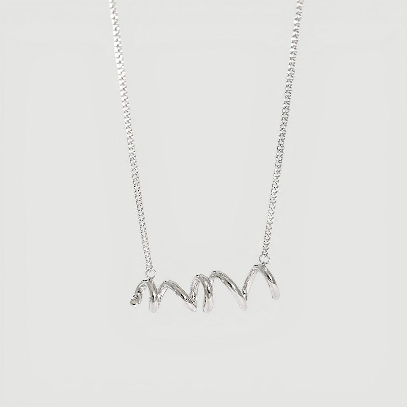 Amara Jewels silver spiral twist necklace with polished finish and contemporary coiled design.