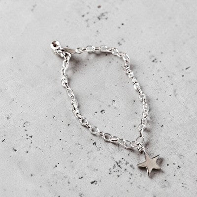Amara Jewels sterling silver chain bracelet with a dangling star charm and adjustable clasp.