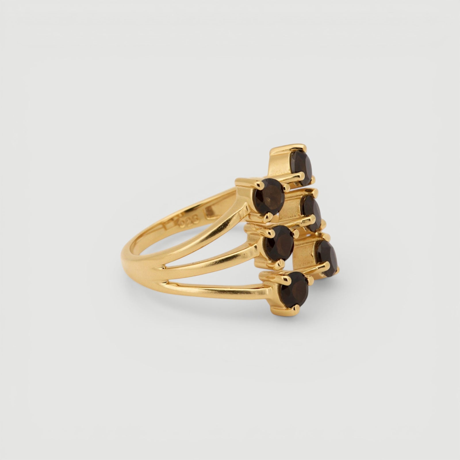 Amara Jewels triple band ring with six bezel-set smoky topaz gemstones in 18K gold vermeil over sterling silver.