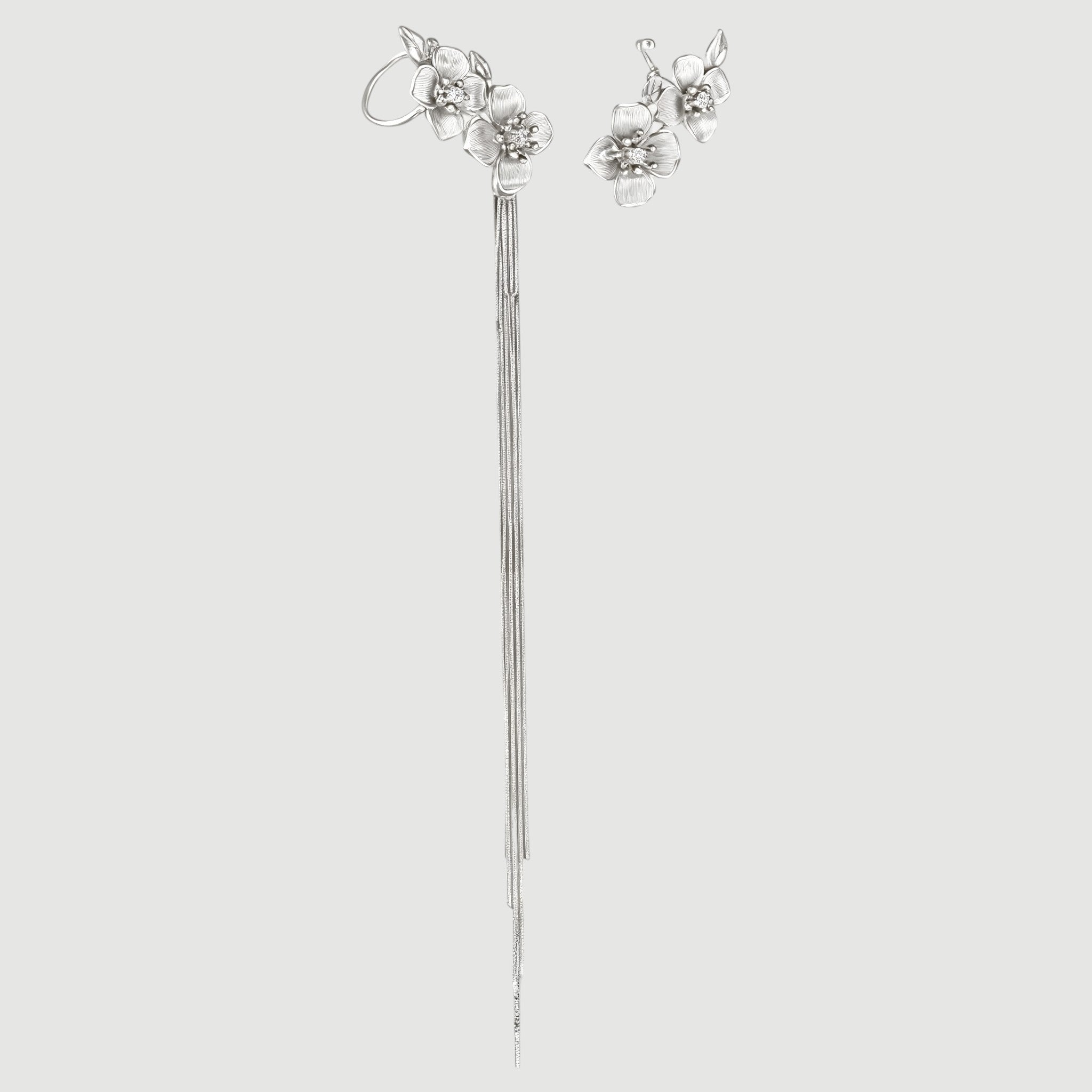 Amara Jewels Sterling Silver Floral Tassel Drop Earrings with delicate floral design and cascading and long, flowing tassels.