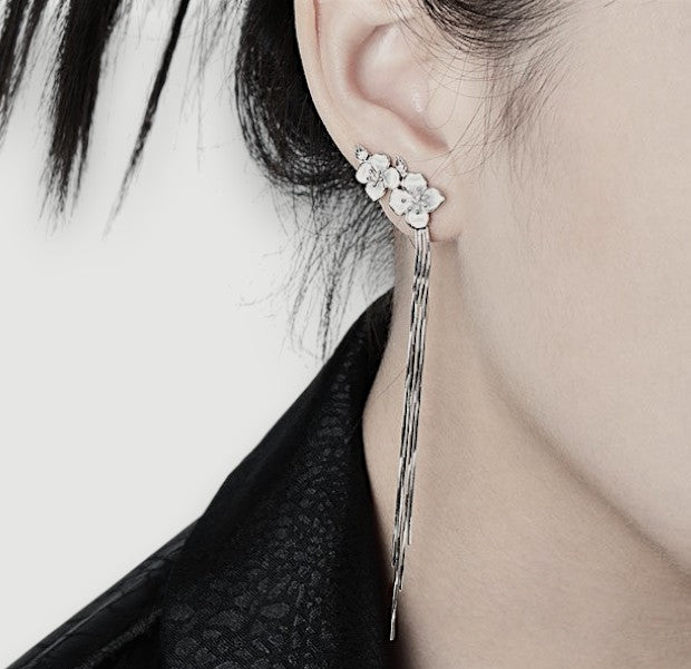 Amara Jewels Sterling Silver Floral Tassel Drop Earrings with delicate floral design and cascading and long, flowing tassels.