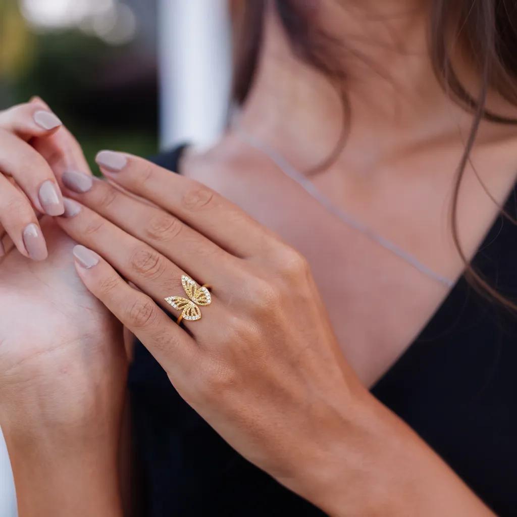Amara Jewels gold-plated 925 sterling silver open ring with intricate butterfly design and shimmering accents.