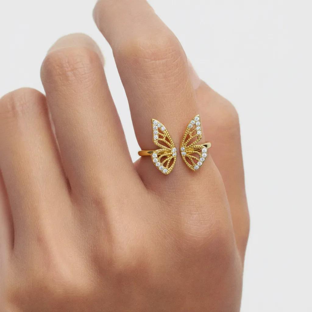 Amara Jewels gold-plated 925 sterling silver open ring with intricate butterfly design and shimmering accents.
