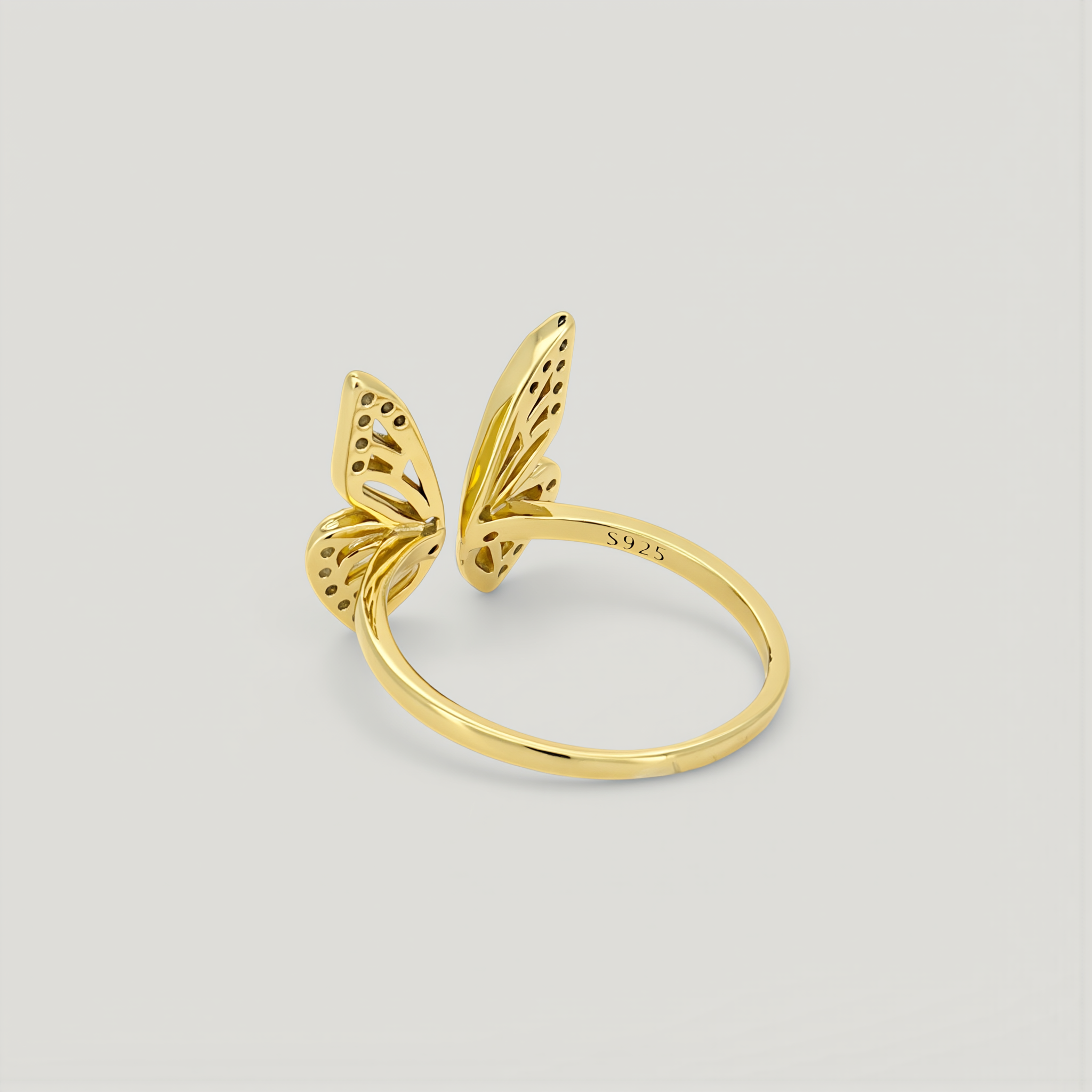 Amara Jewels gold-plated 925 sterling silver open ring with intricate butterfly design and shimmering accents.