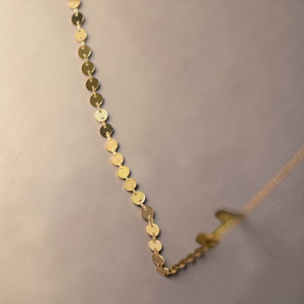 Amara Jewels gold-plated sterling silver bracelet with interlocking polished discs, adjustable chain, and lobster clasp.