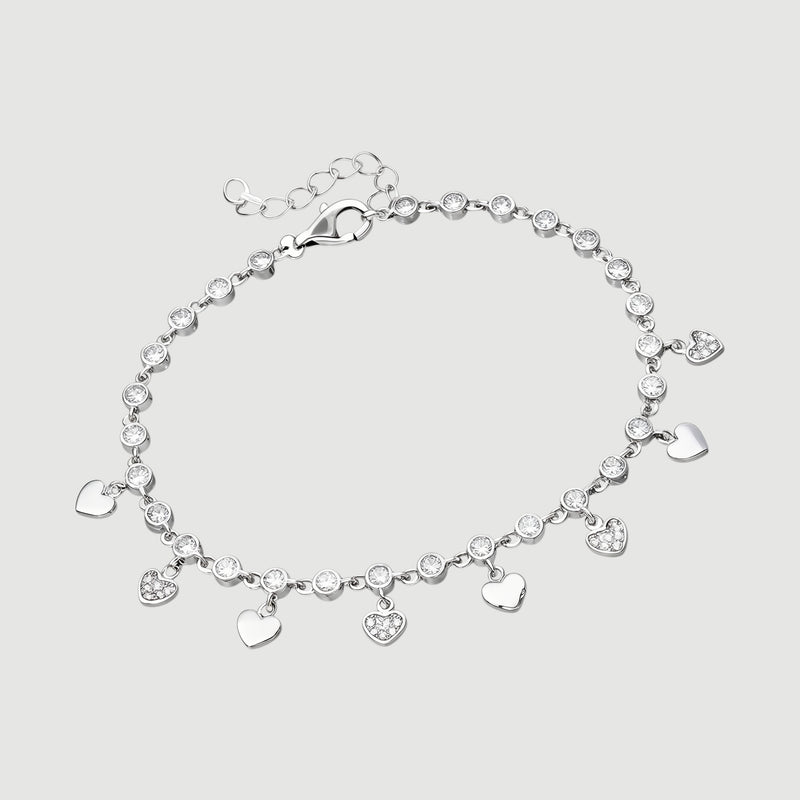 Amara Jewels sterling silver bracelet with cubic zirconia stones and dangling heart charms.