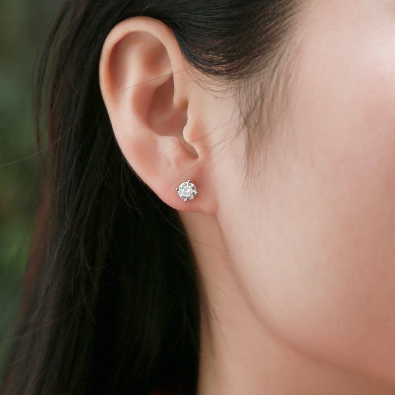 Amara Jewels sterling silver round-cut cubic zirconia Moissanite stud earrings with four-prong setting.