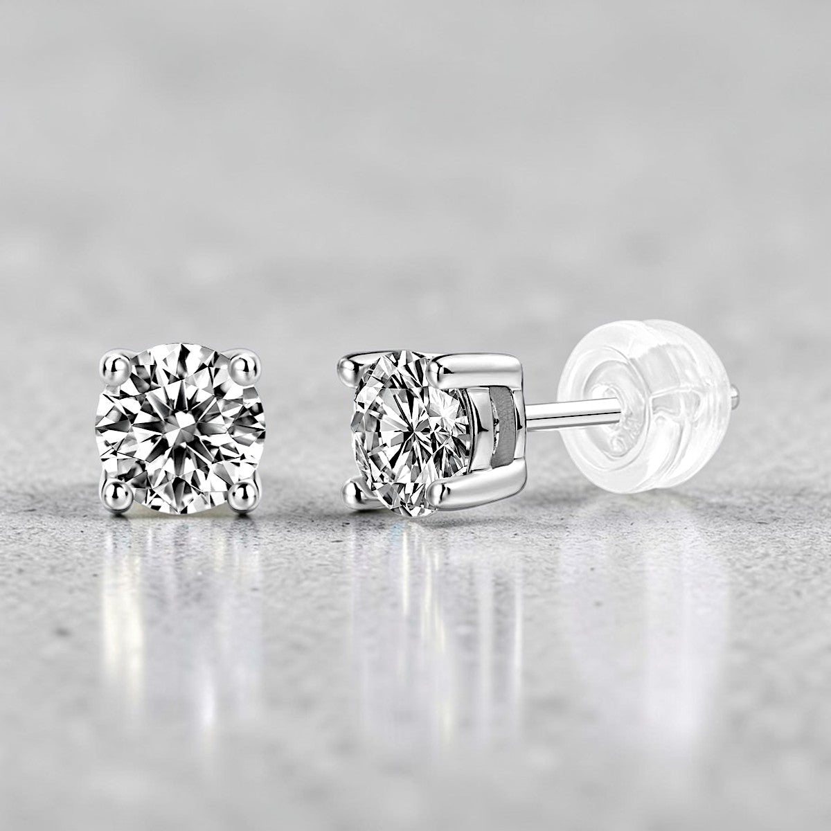 Amara Jewels sterling silver round-cut cubic zirconia Moissanite stud earrings with four-prong setting.