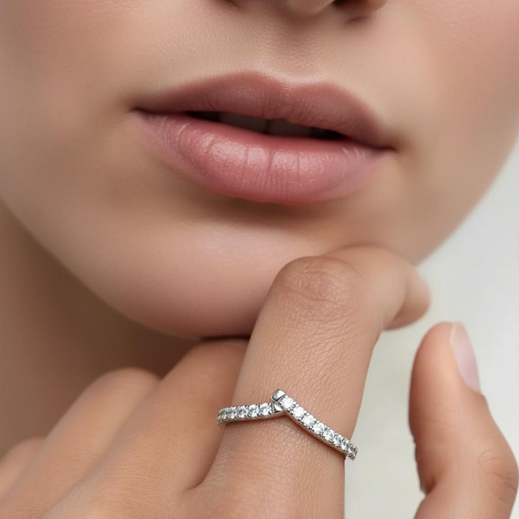Amara Jewels V-shape ring with pavé-set cubic zirconia stones on a slim sterling silver band.