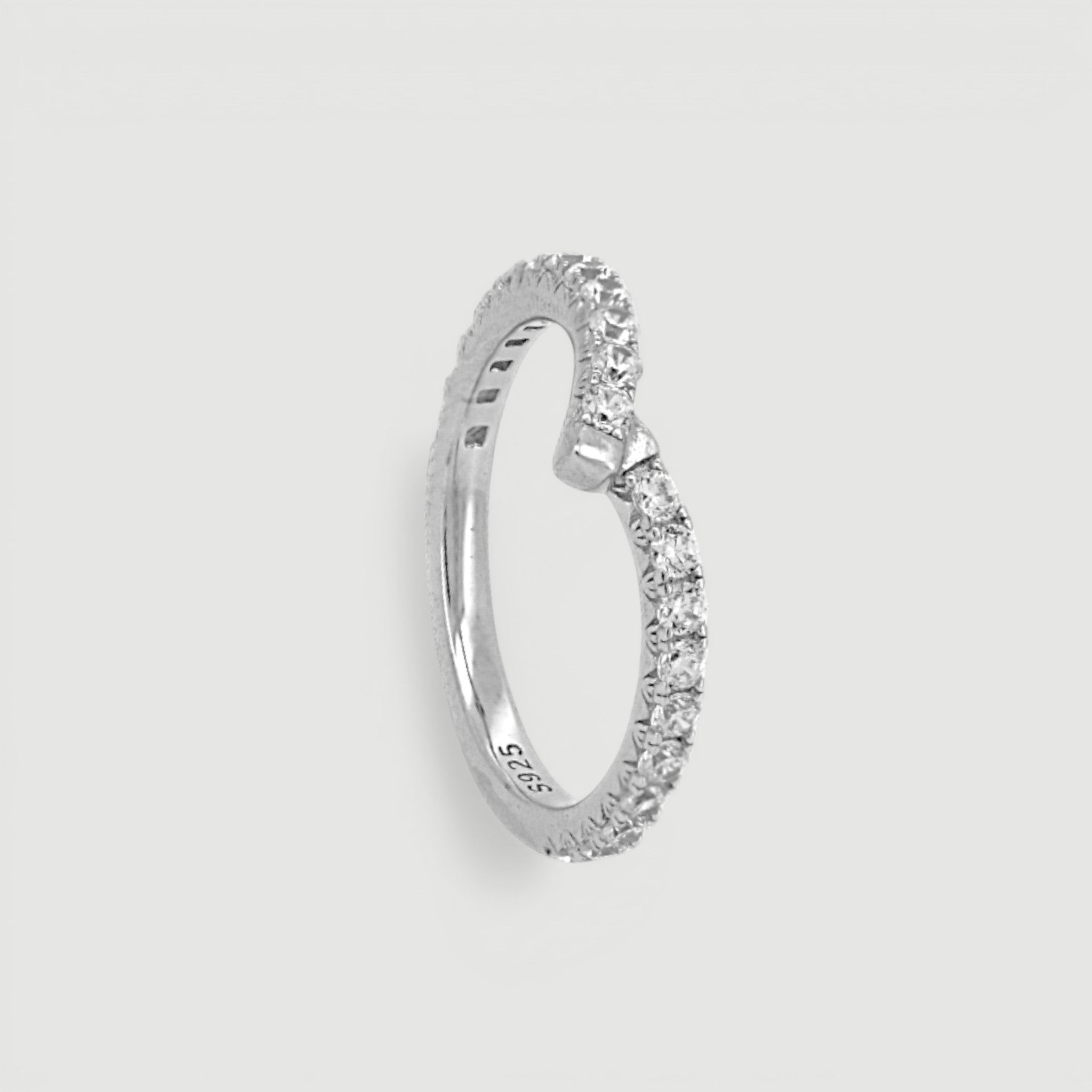 Amara Jewels V-shape ring with pavé-set cubic zirconia stones on a slim sterling silver band.