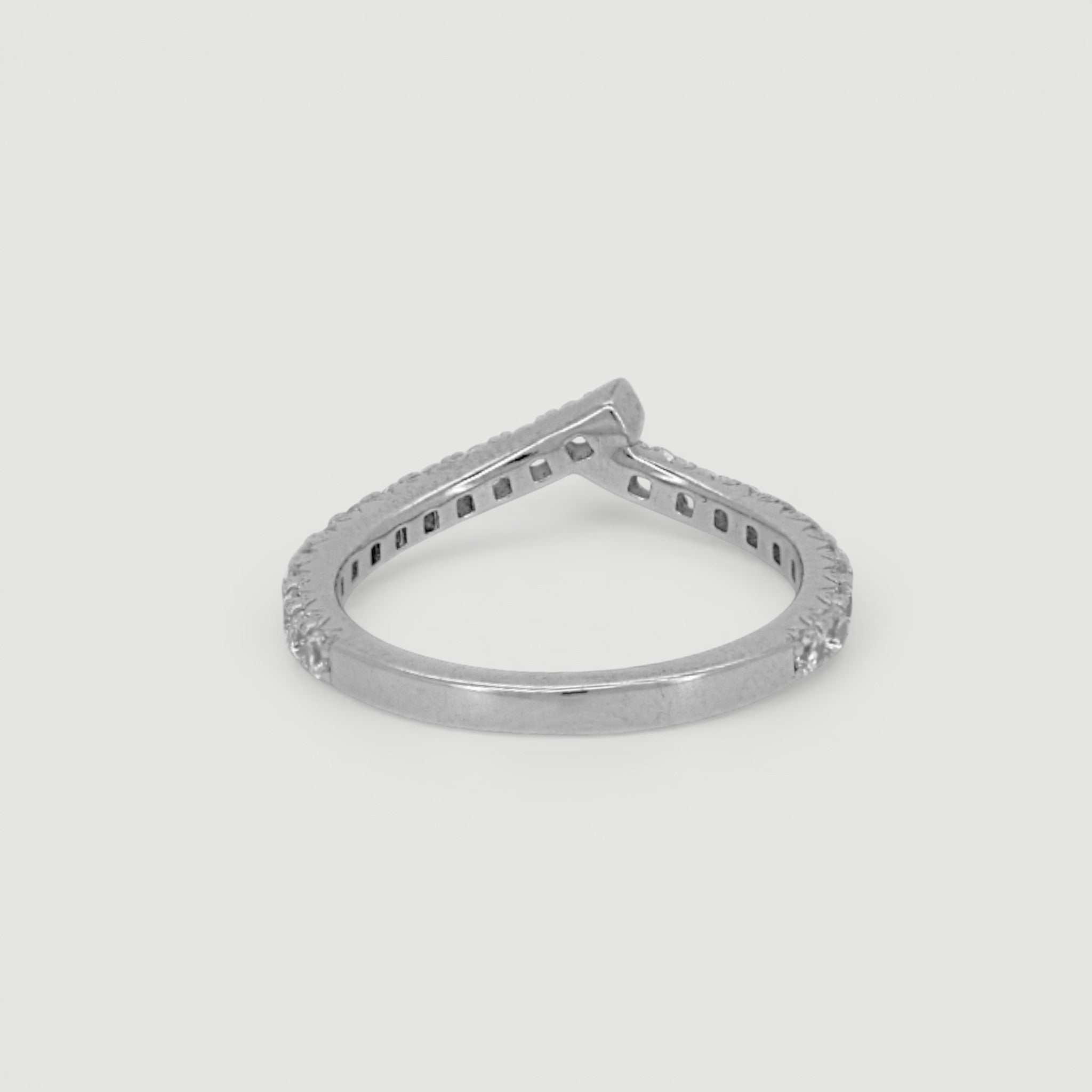 Amara Jewels V-shape ring with pavé-set cubic zirconia stones on a slim sterling silver band.