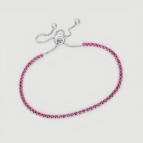 Amara Jewels sterling silver adjustable tennis bracelet with pink ruby gemstones and slider clasp.