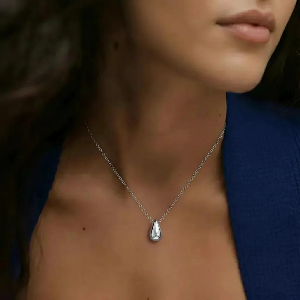 Amara Jewels sterling silver teardrop pendant necklace with a delicate chain.
