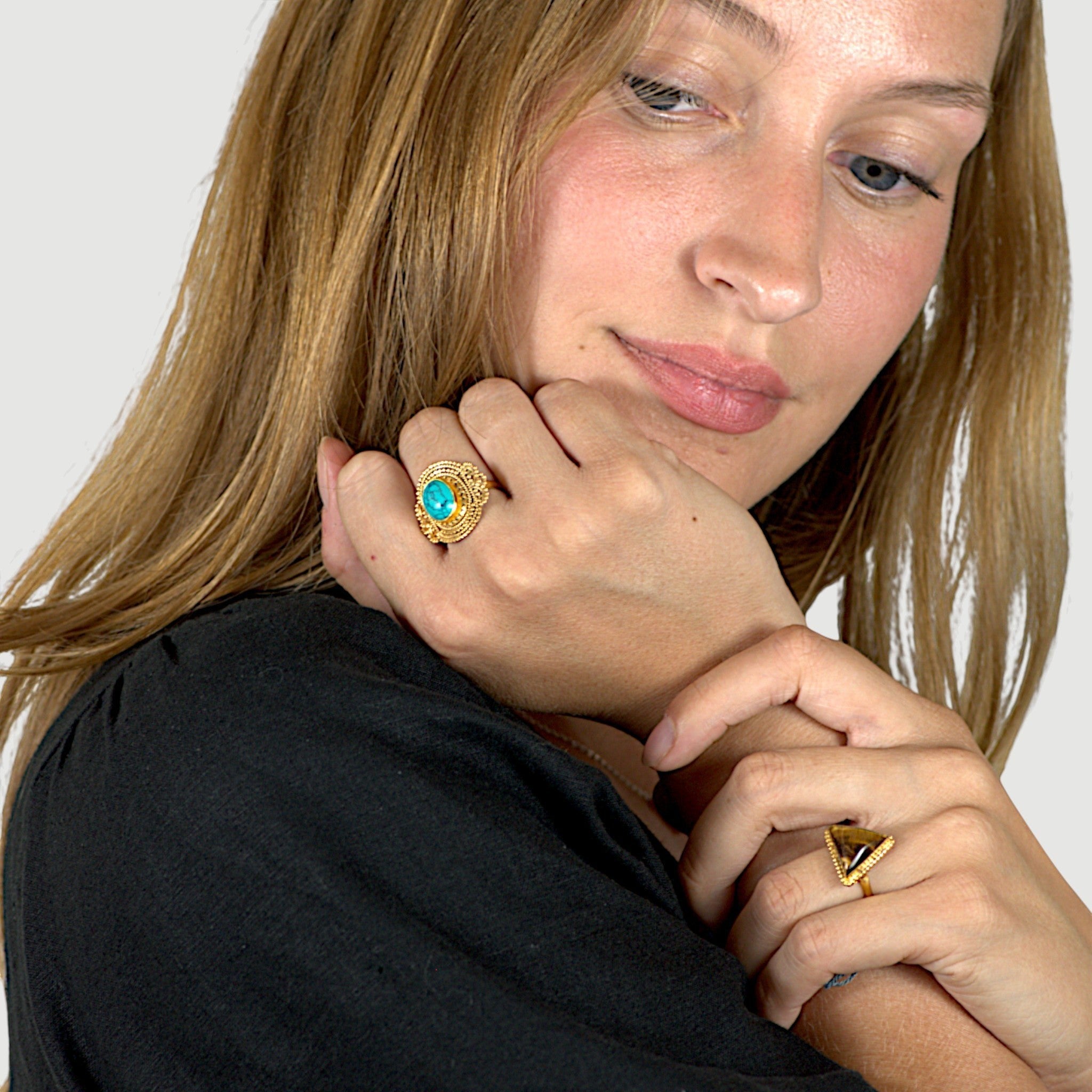 Amara Jewels antique-inspired oval turquoise ring with intricate gold detailing on sterling silver with 18K gold plating.