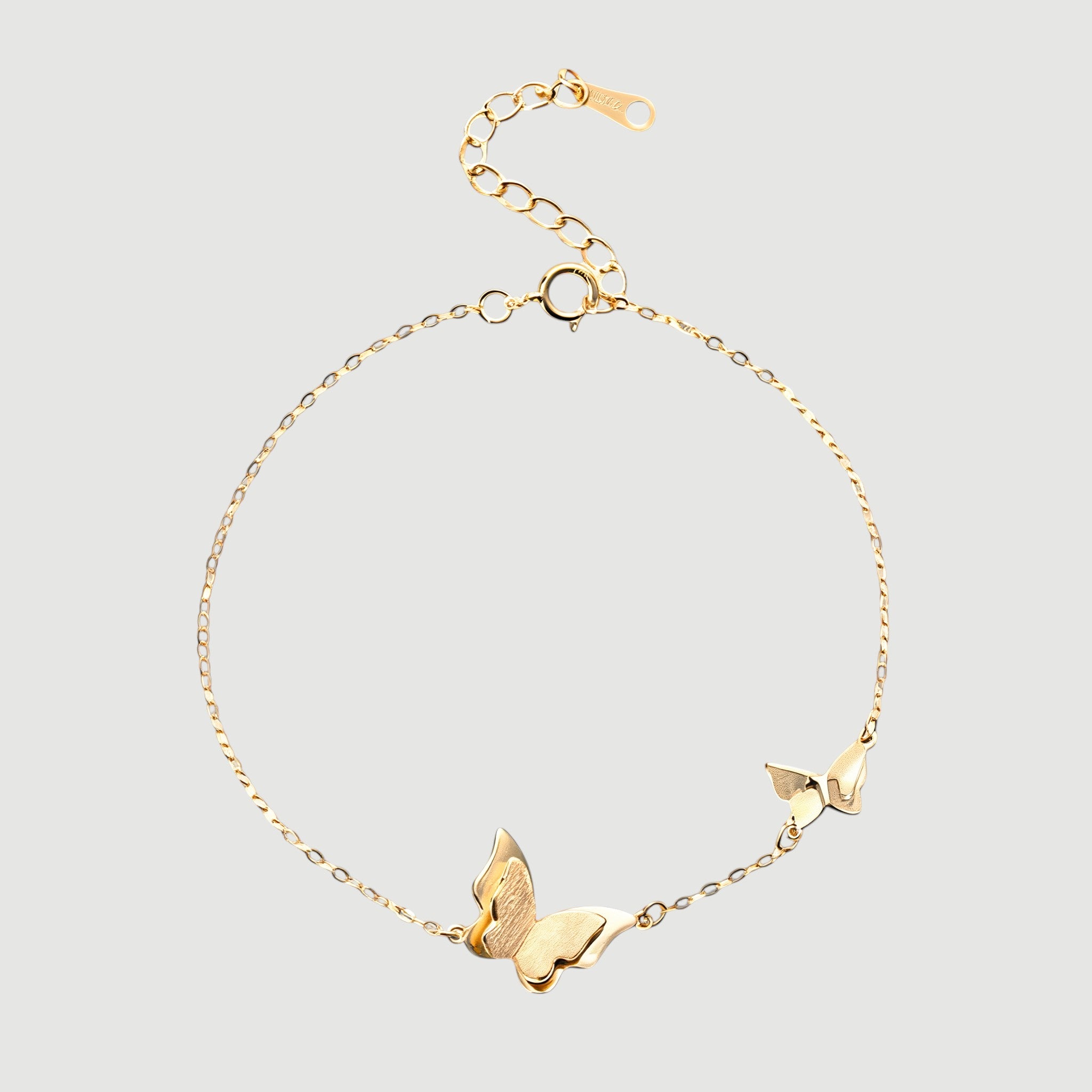 Amara Jewels delicate gold-plated 925 sterling silver bracelet with two butterfly charms and an adjustable chain.