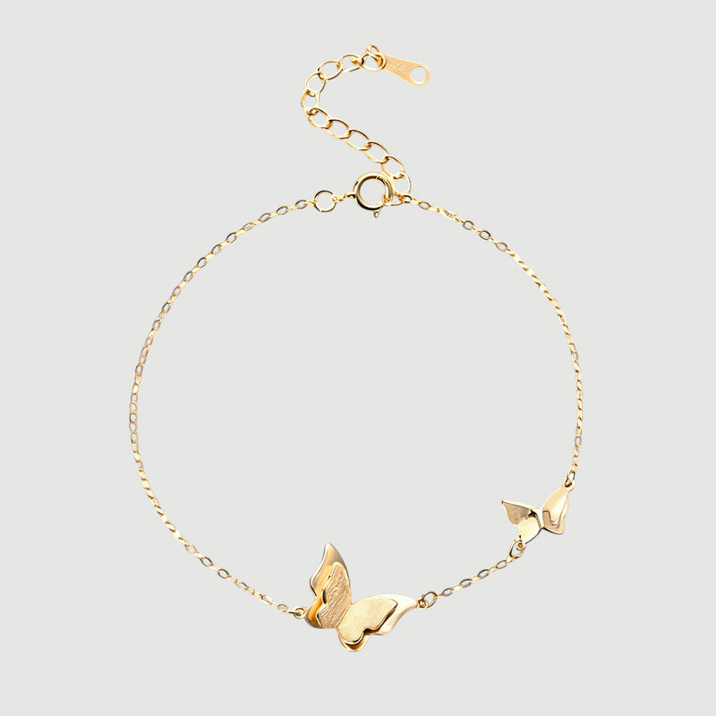 Amara Jewels delicate gold-plated 925 sterling silver bracelet with two butterfly charms and an adjustable chain.