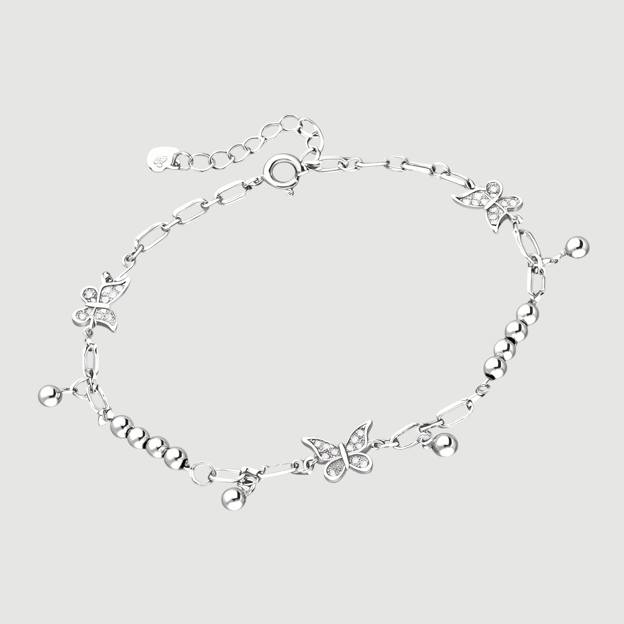 Amara Jewels sterling silver bracelet with delicate butterfly charms and polished silver beads, adjustable clasp.
