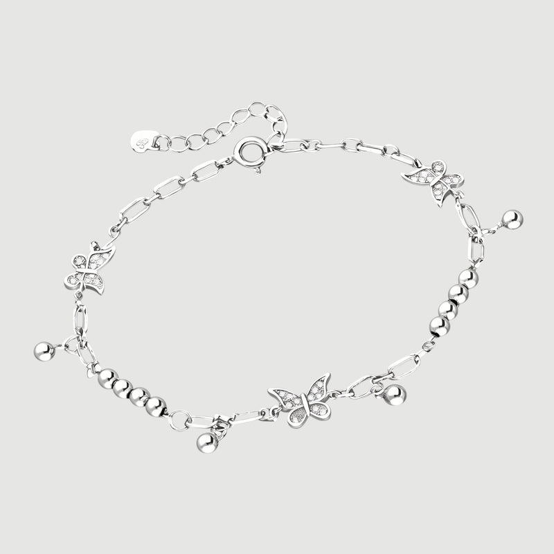 Amara Jewels sterling silver bracelet with delicate butterfly charms and polished silver beads, adjustable clasp.